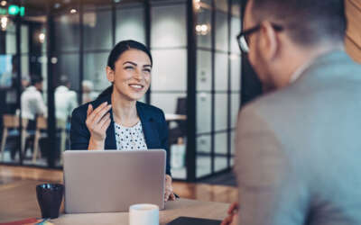 Business persons talking in the office